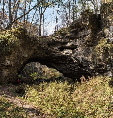 A natural arch over a trail
