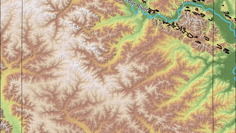 Benton County shows the contrast between the Cedar and Iowa River valleys. The Cedar has numerous dunes (black lines) coming out of the valley while the Iowa largely lacks these features.